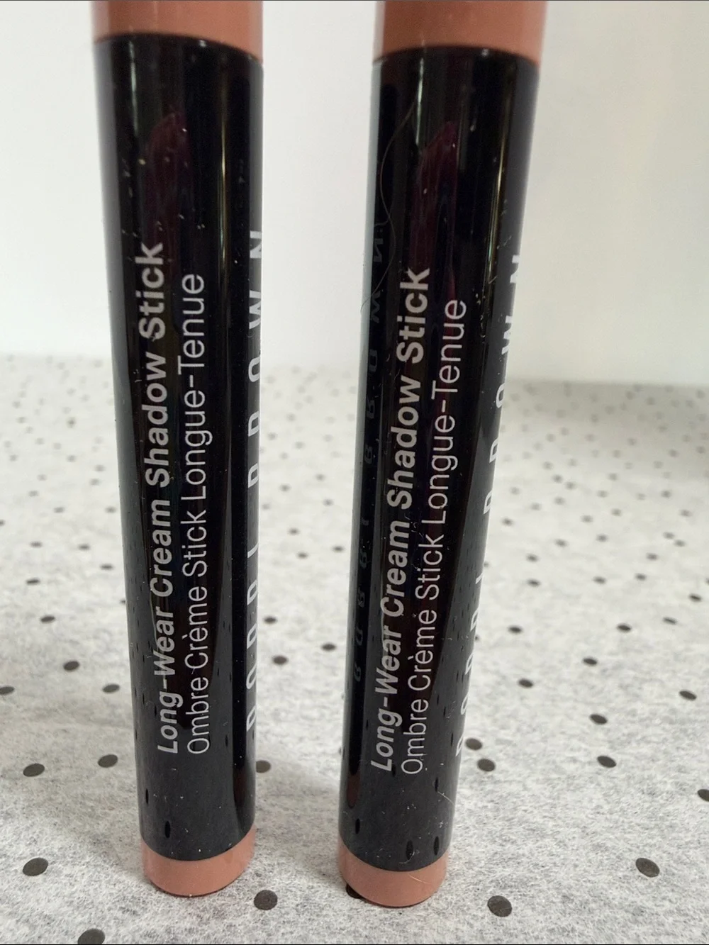 2 Bobbi Brown long warm cream shadow stick in antique rose and toffee